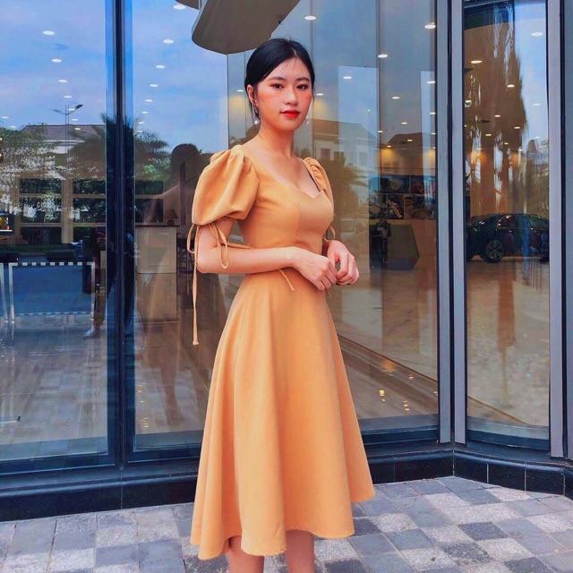 Đầm kem xoè tay bồng