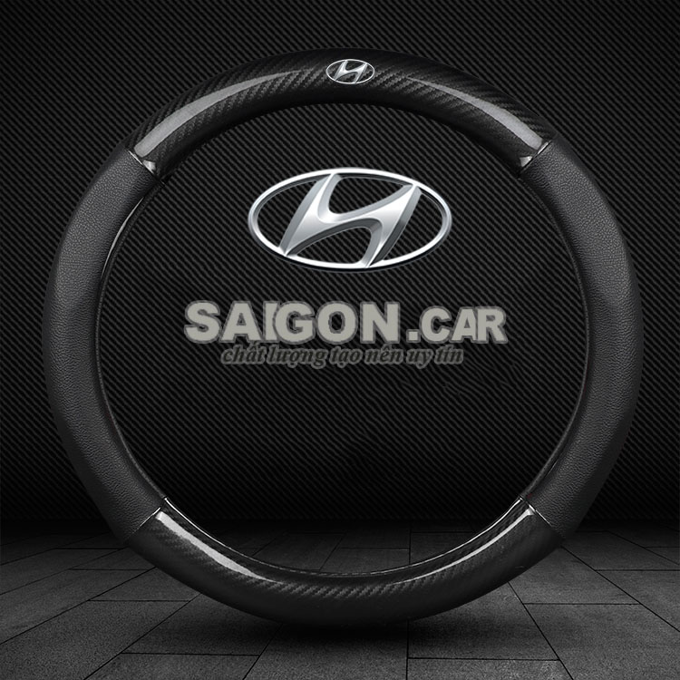 [HCM]Bọc vô lăng ô tô ,bọc da vô lăng ,vỏ bọc vô lăng -mẫu da cacbonloại có đính logo Hyundai theo xe-có đường kính 37-38cm bọc vừa cho mọi loại xe 4 chỗ 5 chỗ và 7 chỗ  dễ dàng có thể bọc tại nhà