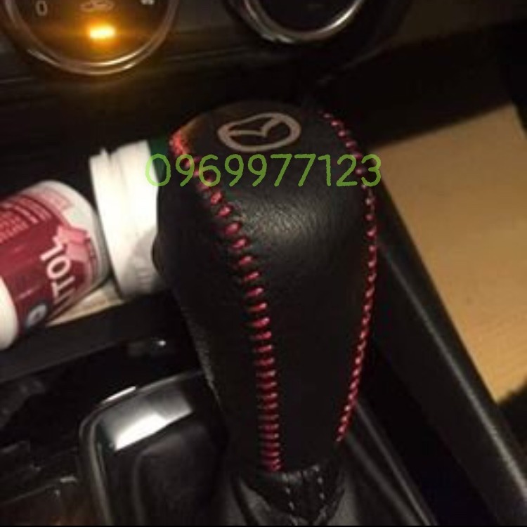 Bọc cần số mazda 2,3,6, BT50, CX5, CX8 da bò thật khâu thủ công. khắc logo mazda theo yêu cầu, nhiều màu sắc