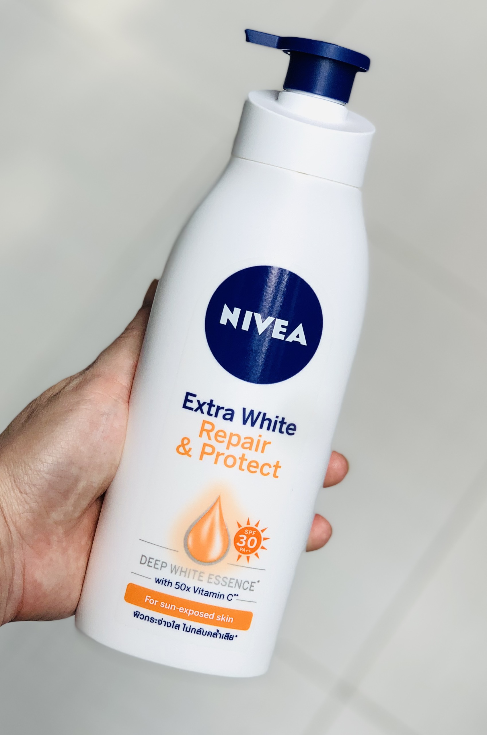 1 chai sữa dưỡng thể sáng da nivea extra white repair & protect spf30 pa++ - dùng ban ngày - 350ml - hàng thái lan