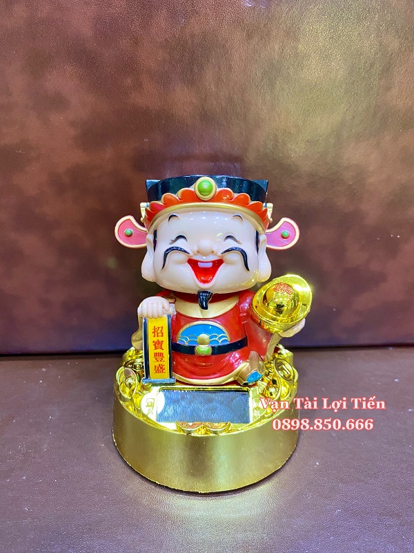 Thần tài gật đầu gọi khách chiêu tài may mắn năng lượng mặt trời