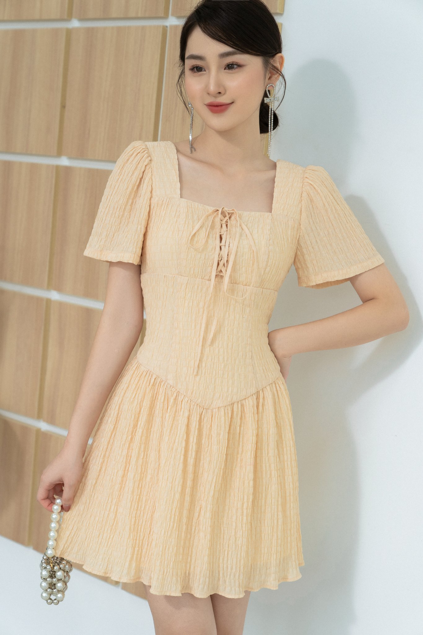 Váy cổ vuông đan dây nơ tiinstore v0t584