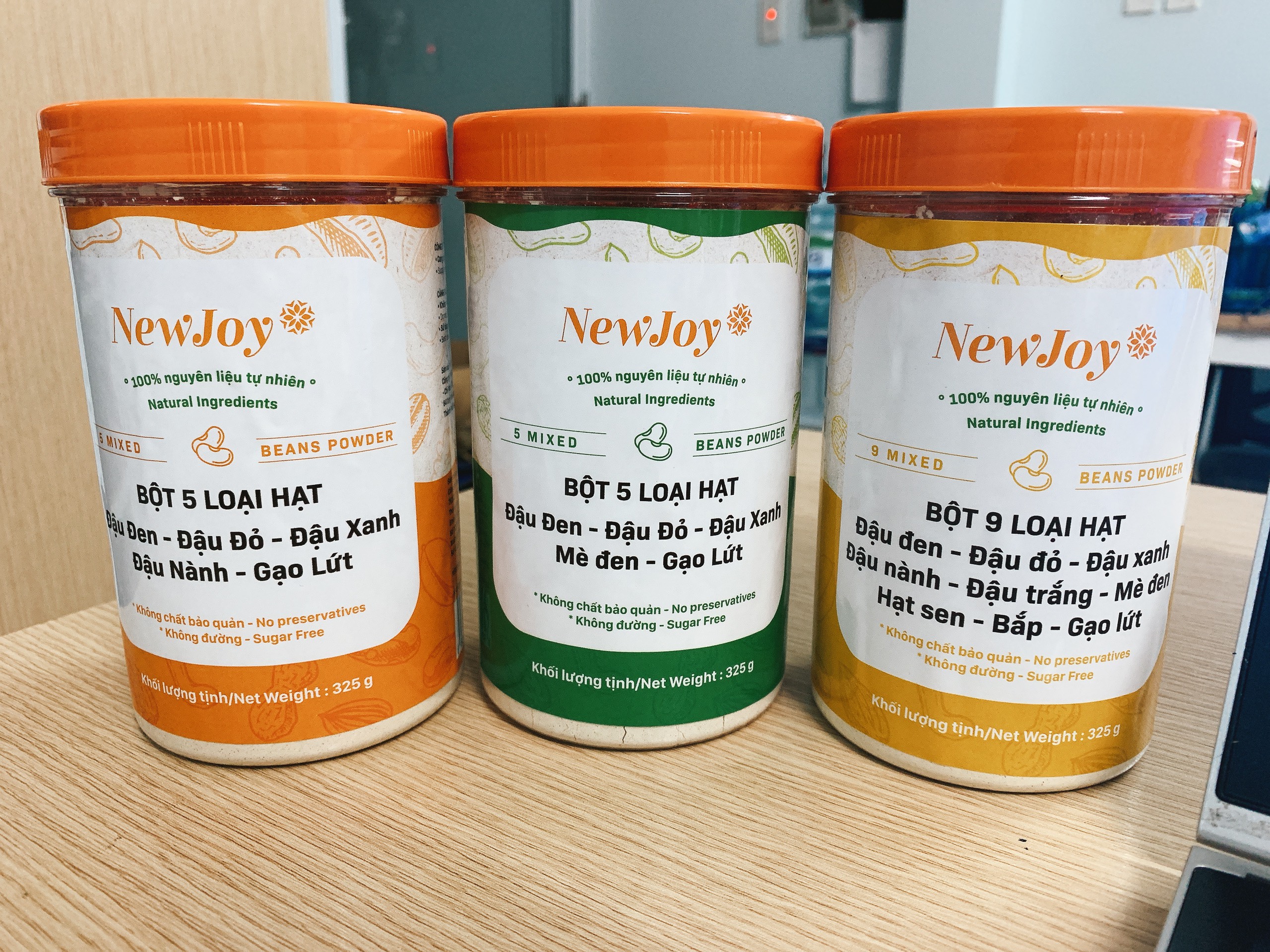 Bột các loại hạt, đậu , ngũ cốc, không đường, pha với nước, hũ 325g thương hiệu New Joy