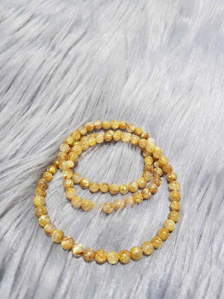 Vòng Đá Thạch Anh Tóc Vàng 6 Li Đeo Tay Hoặc Tràng Cổ