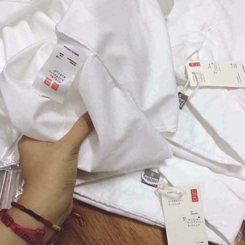 Áo sơ mi trắng cổ bẻ