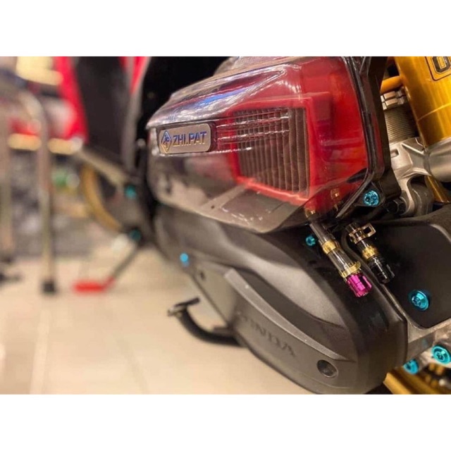 Ống xả cặn Pô E gắn trang trí Vario Click AirBlade Vision SH Scoopy SH mode