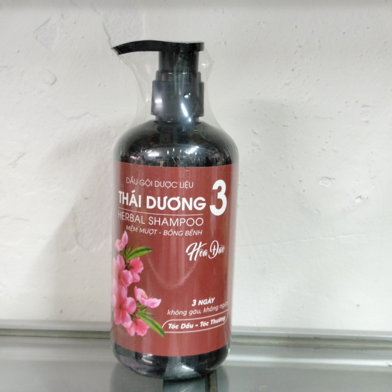 Dầu gội dược liệu Thái Dương 3 hoa đào chai 500ml