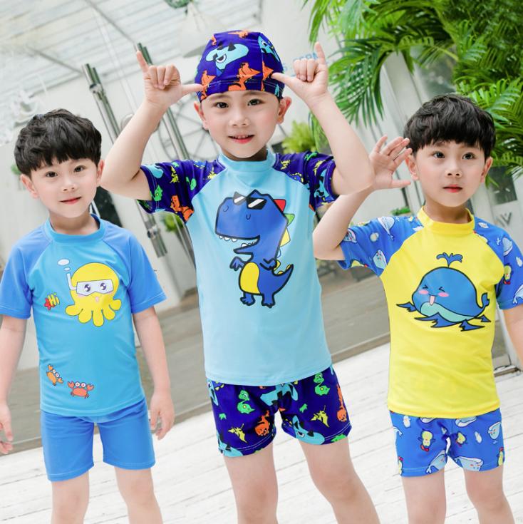Đồ bơi bé trai quần rời nhiều họa tiết máy bay, cá heo, khủng long tặng kèm nón (Size 12-34.35kg)