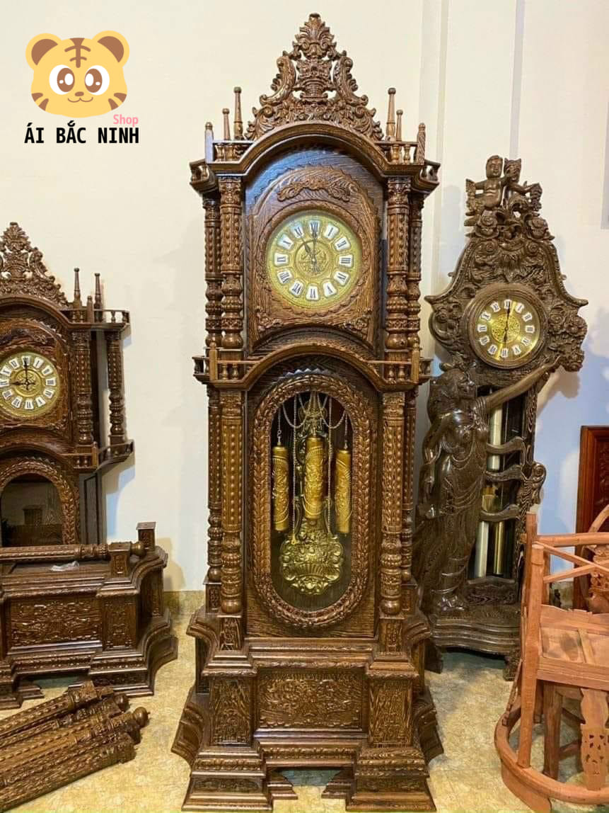 Đồng hồ tứ trụ gỗ mun đuôi công kích thước cao 2m30 ngang 90 sâu 40 máy hàn quốc giả cổ