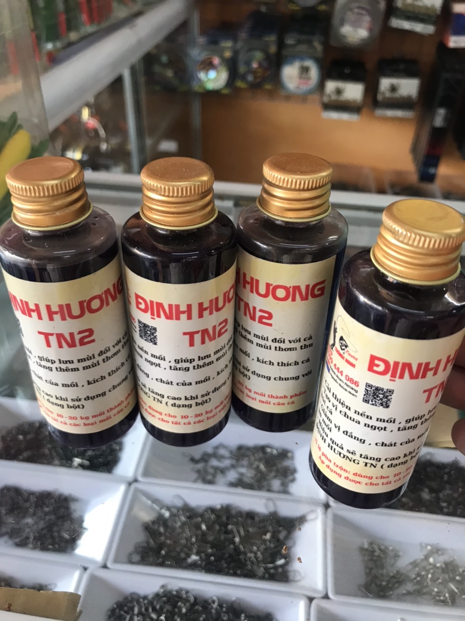 01 chai định hương nước tn2 trộn mồi câu cá-kích thích cá ăn