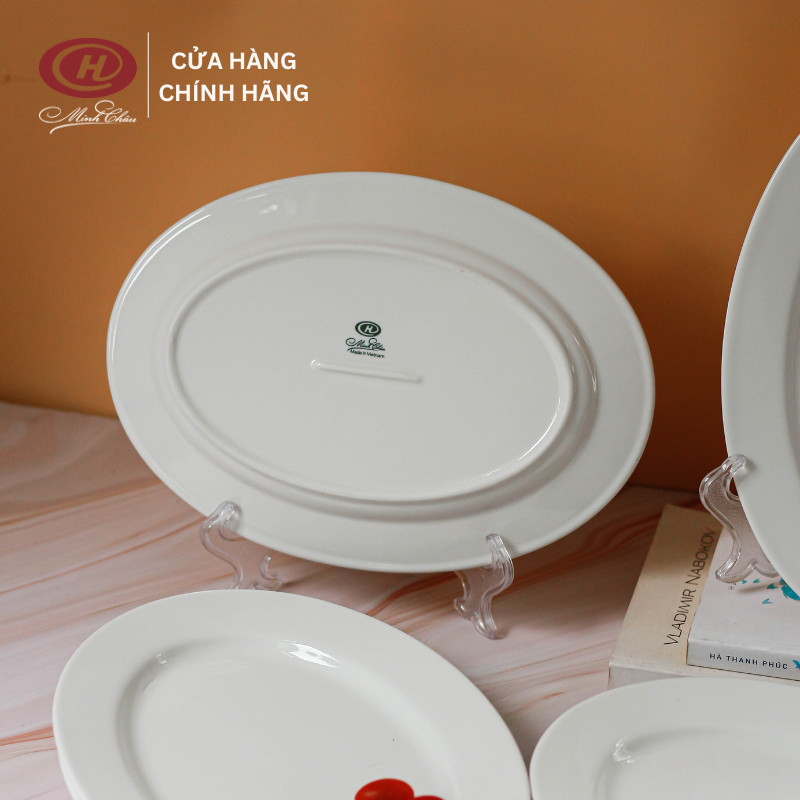 Đĩa xoài cạn dáng bầu dục trắng trơn - sứ minh châu - vỡ 1 đổi 1