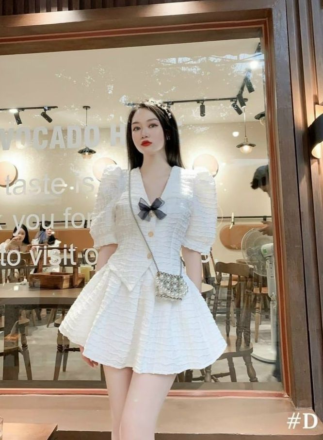 Set chân váy xòe gấm nổi áo tiểu thư tay phồng đính nơ set nữ đi tiệc sang chảnh hàn