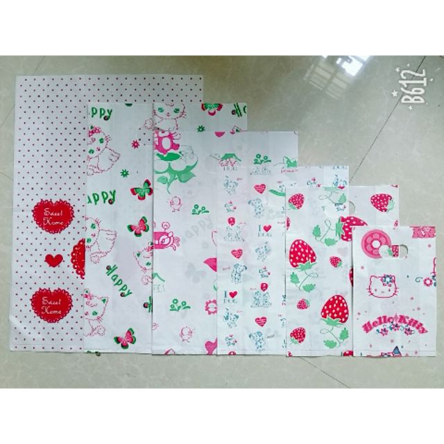 [HCM]( 1kg ) Túi xốp in hình ngẫu nhiên - Túi hột xoài HD in hình ngẩu nhiên - Túi gói hàng đựng hàng