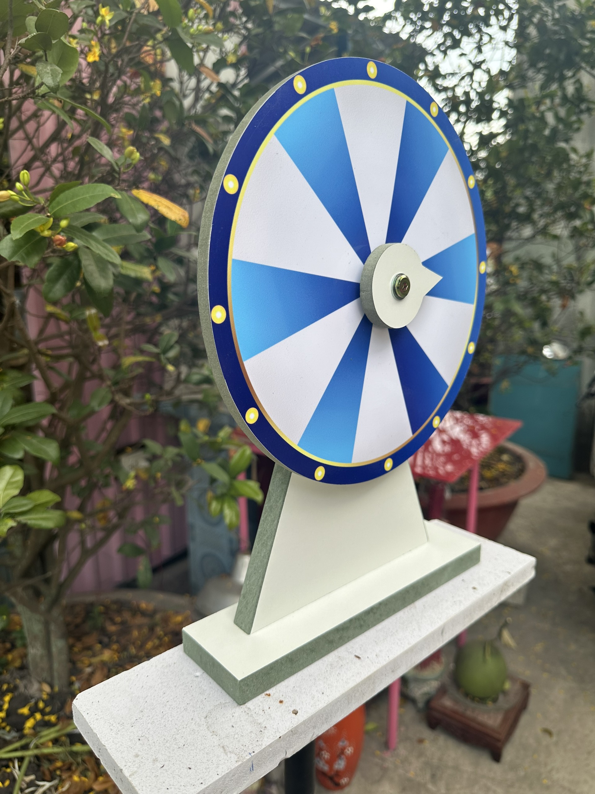 Vòng quay ( may mắn xanh dương trắng viền xanh dương 12 ô - kt: 25cm x 35cm)