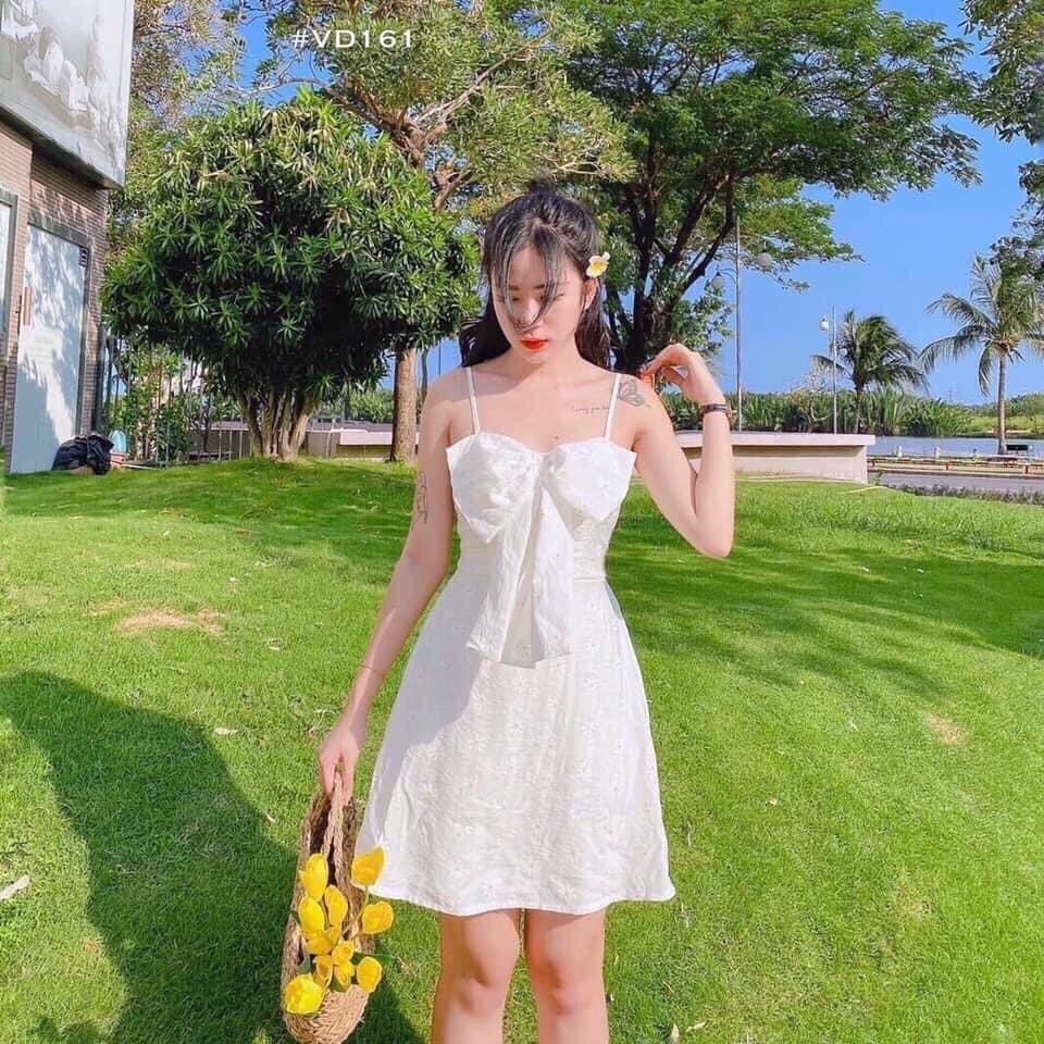 Đầm nữ màu trắng hoa cúc cúc họa mi kết nơ ngực
