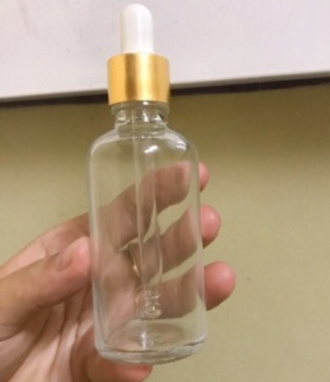 Chai thủy tinh trong suốt nắp bóp màu vàng cao cấp đựng tinh dầu, serum, mỹ phẩm
