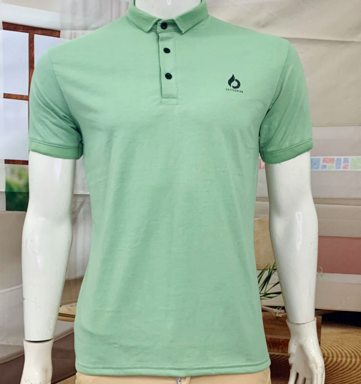 Áo cổ bẻ xanh đậu