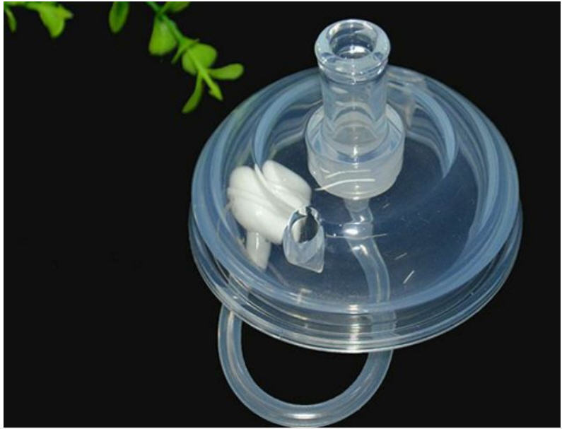 Núm ti tập hút và uống nước bình sữa Comotomo
