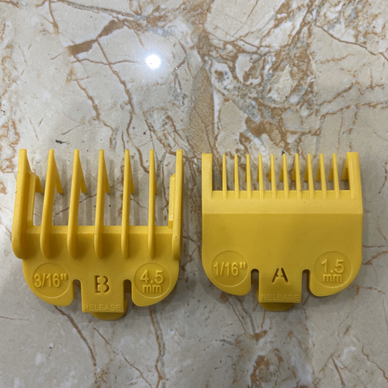 Bộ cữ 1,5mm và 4,5mm dành cho các loại tông đơ( màu ngẫu nhiên)