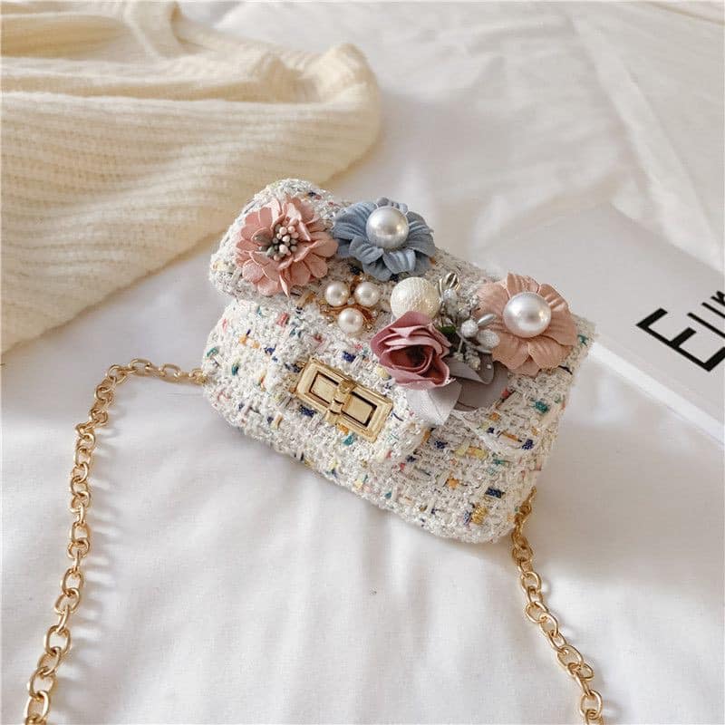 Túi dạ mini đính hoa đeo chéo cho bé
