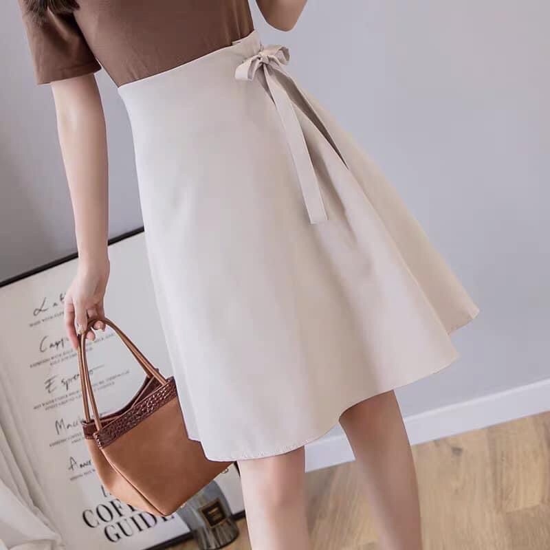 Chân váy chữ A công sở thắt nơ dài đến gối trẻ trung