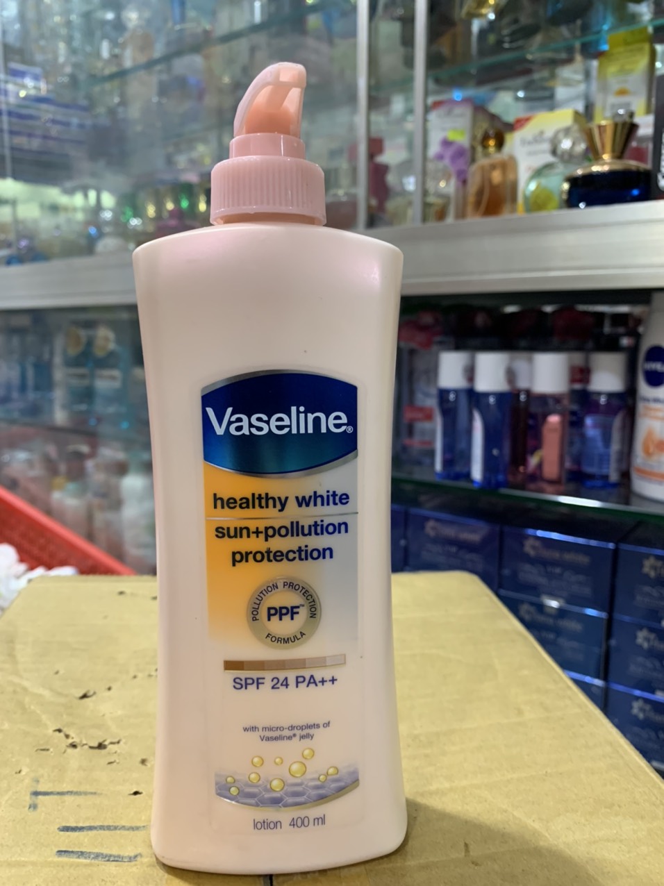 Sữa dưỡng thể vaseline trắng da,chống nắng chai vòi 400ml