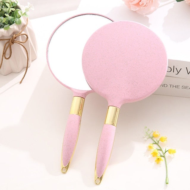 Gương công chúa cầm tay siêu tiện lợi