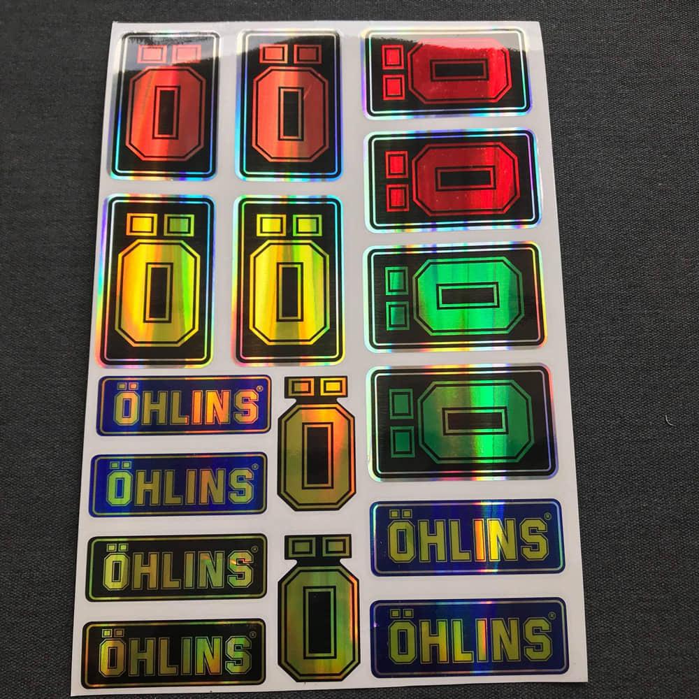 TEM TẤM LOGO OHLIN NHIỀU MÀU MẠ CROM.