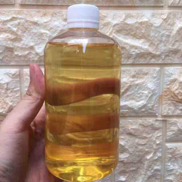 1 lít bằng 2 chai dầu dừa ép nóng hàng chuẩn bến tre thơm nức