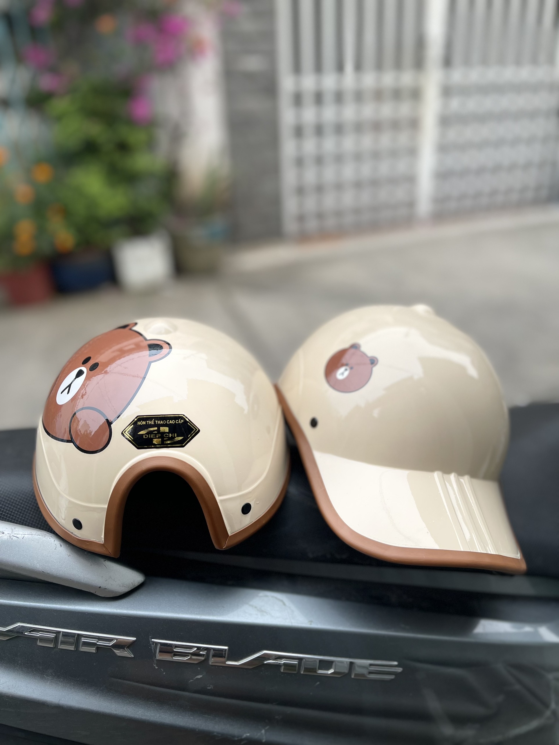 Nón kết in hình gấu panda có lỗ cột tóc
