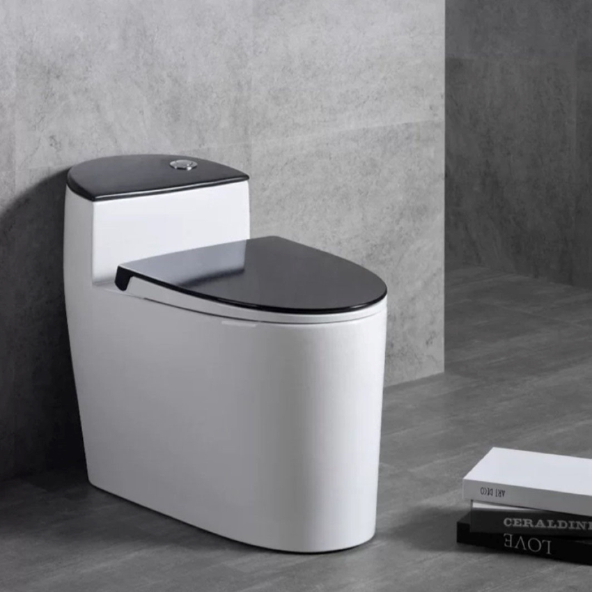 Bồn cầu 1 khối màu trắng nắp đen, nắp chống trầy, hàng có cấu trúc cực kỳ chắc chắn, phong cách hiện đại, rất men sứ rất bền