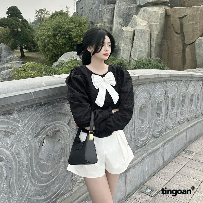 Tingoan® - áo cổ tròn đen đinh nơ ngực phối cúc ngọc candy yumyum top/bl