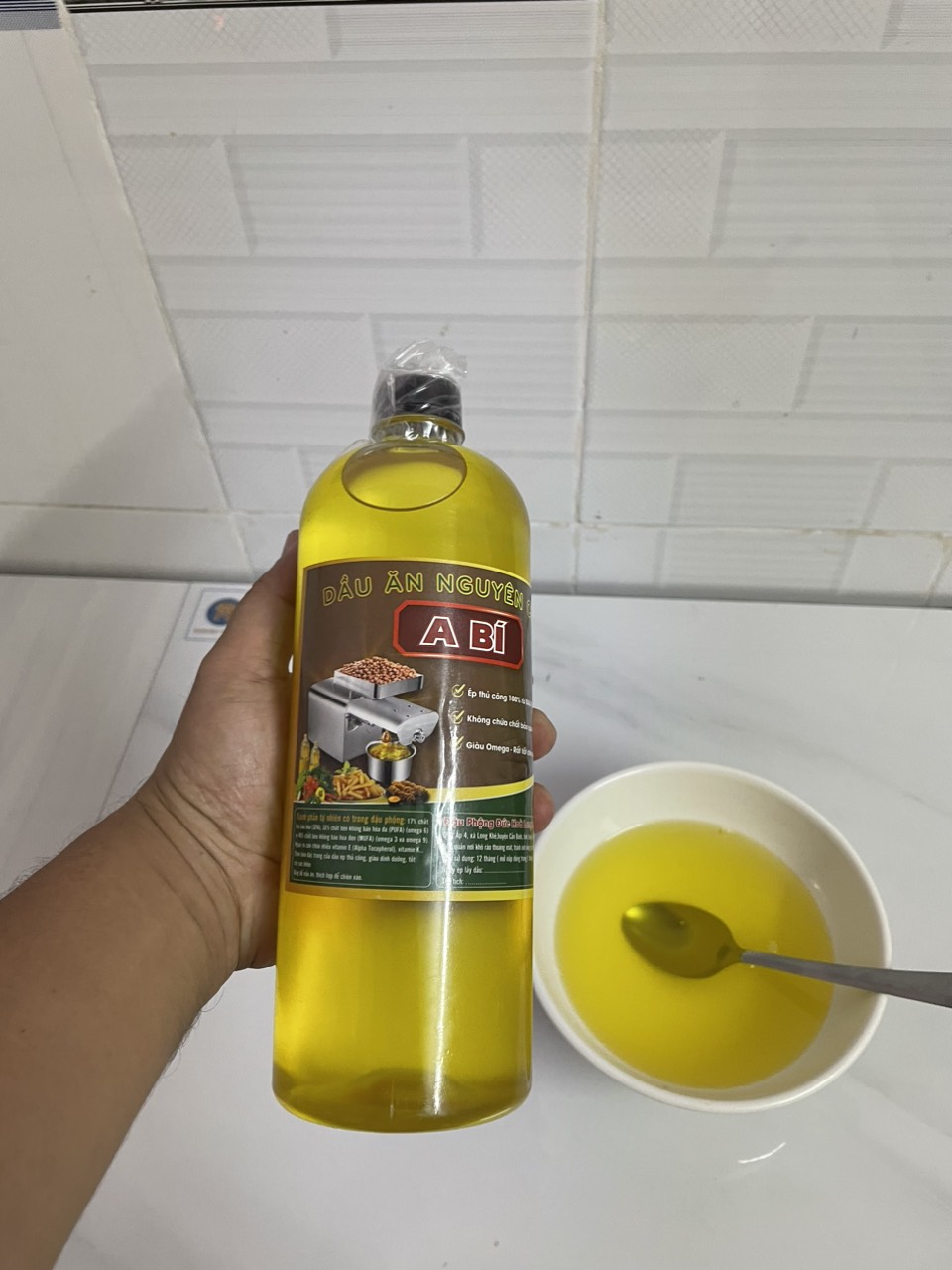 Dầu đậu phộng ép lạnh A Bí