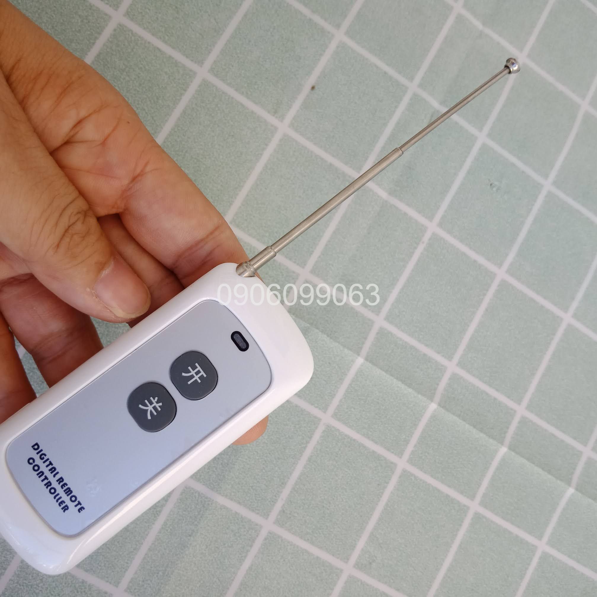 E2 - remote 2 nút trắng đen 315mhz/433mhz tầm xa 100m