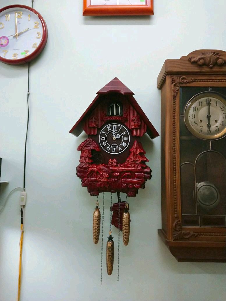 Đồng hồ treo tường Cuckoo Kana hình ngôi nhà. Mã 640.