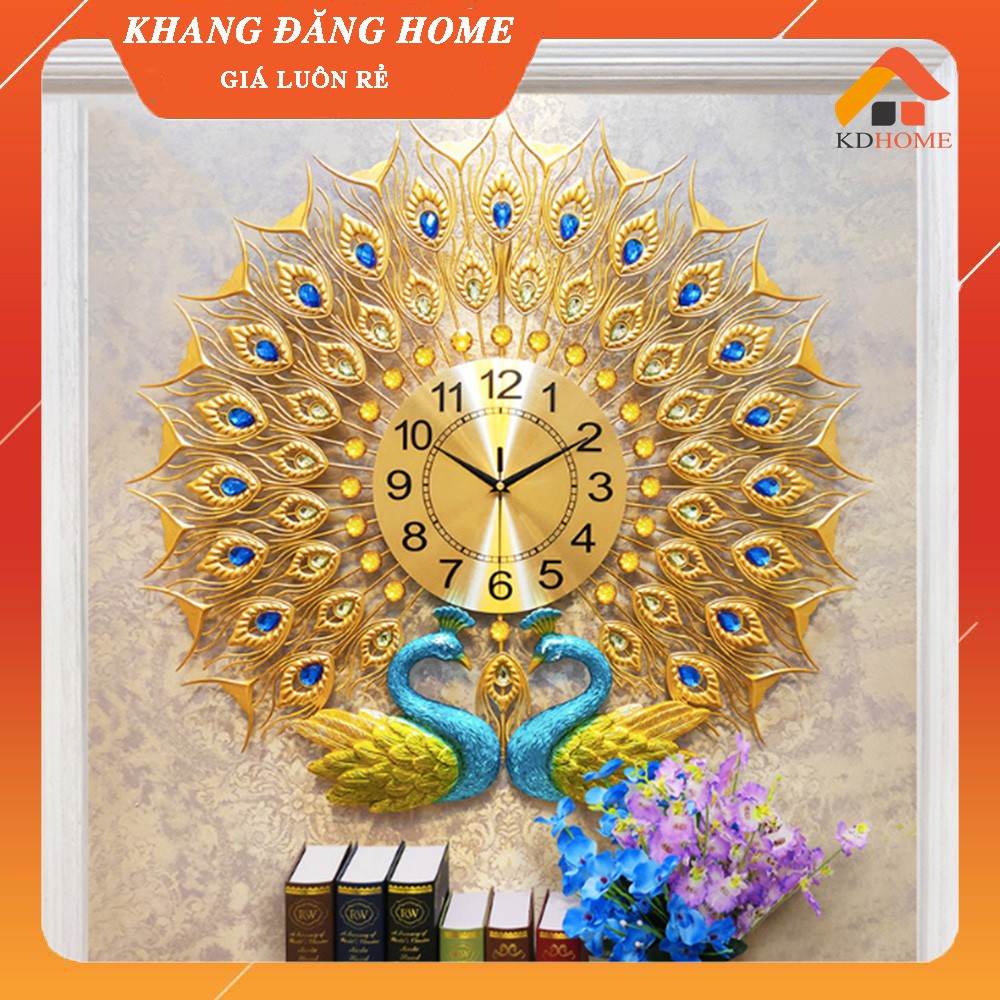 Đồng hồ trang trí treo tường thép sơn tĩnh điện đôi chim công vàng xoè đuôi KD618. Đồng hồ được sản xuất trên dây truyền công nghệ hiện đại theo tiêu chuẩn châu Âu
