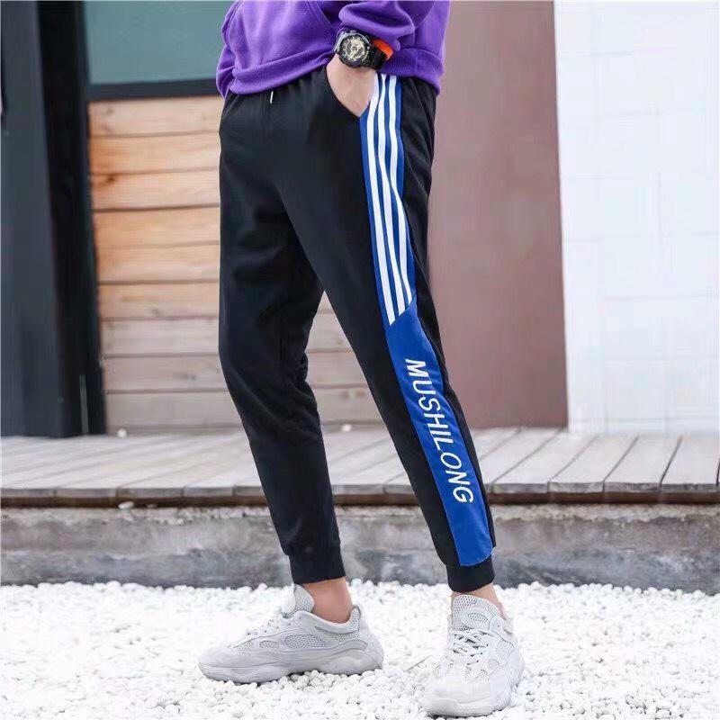 Quần jogger nam movement phối sọc trắng lớn trẻ trung thời trang uzu