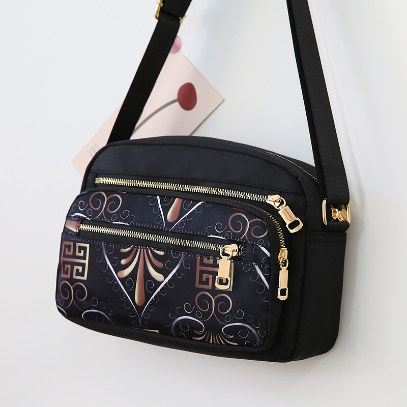 Túi xách đeo chéo nữ nhiều họa tiết chống thấm nước vải dù cao cấp size 26cm TUI-42