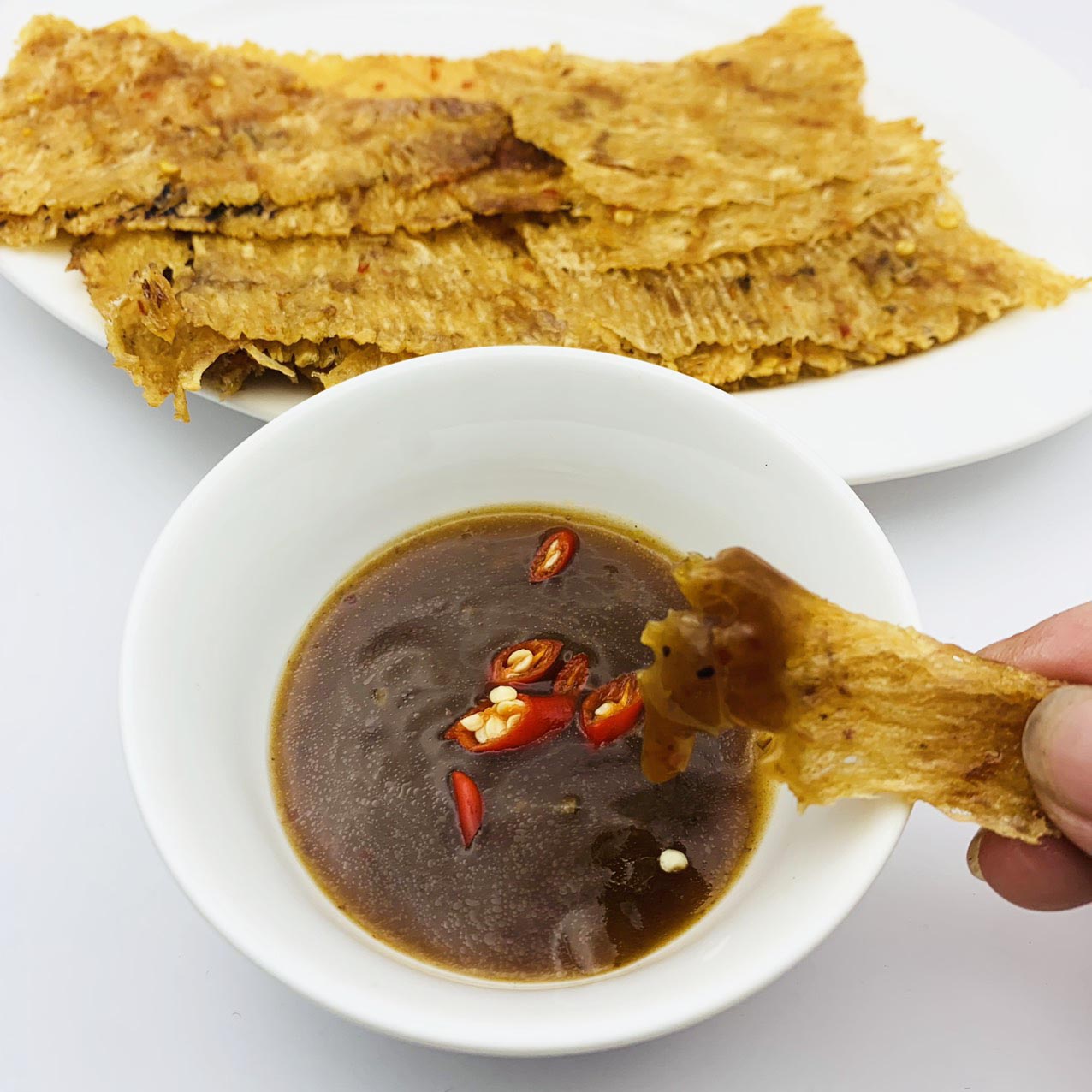 Mực cán chấm sốt me - tui 80-100gr