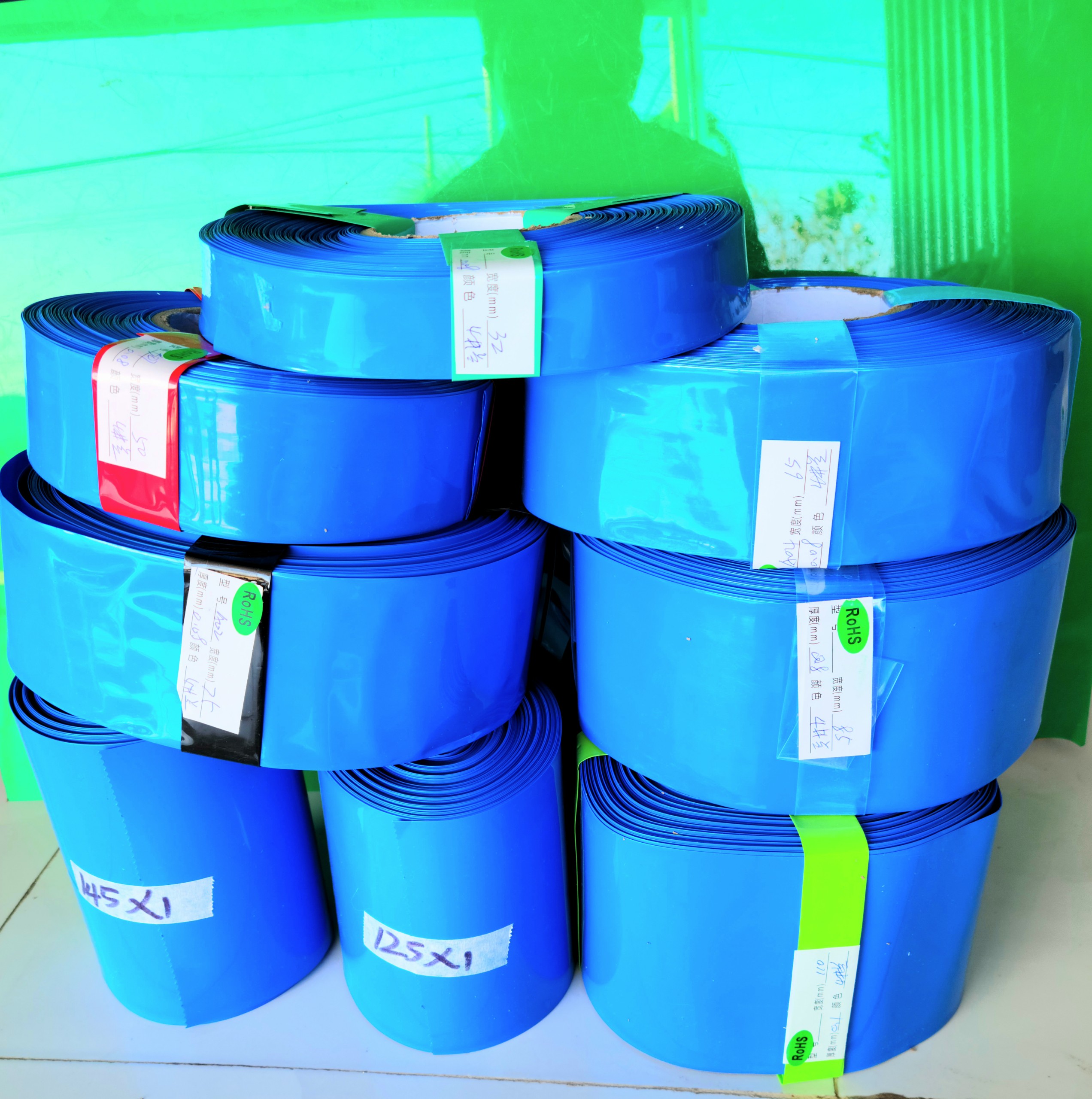 Màng co nhiệt pvc 32~145mm loại dày co giãn cao.