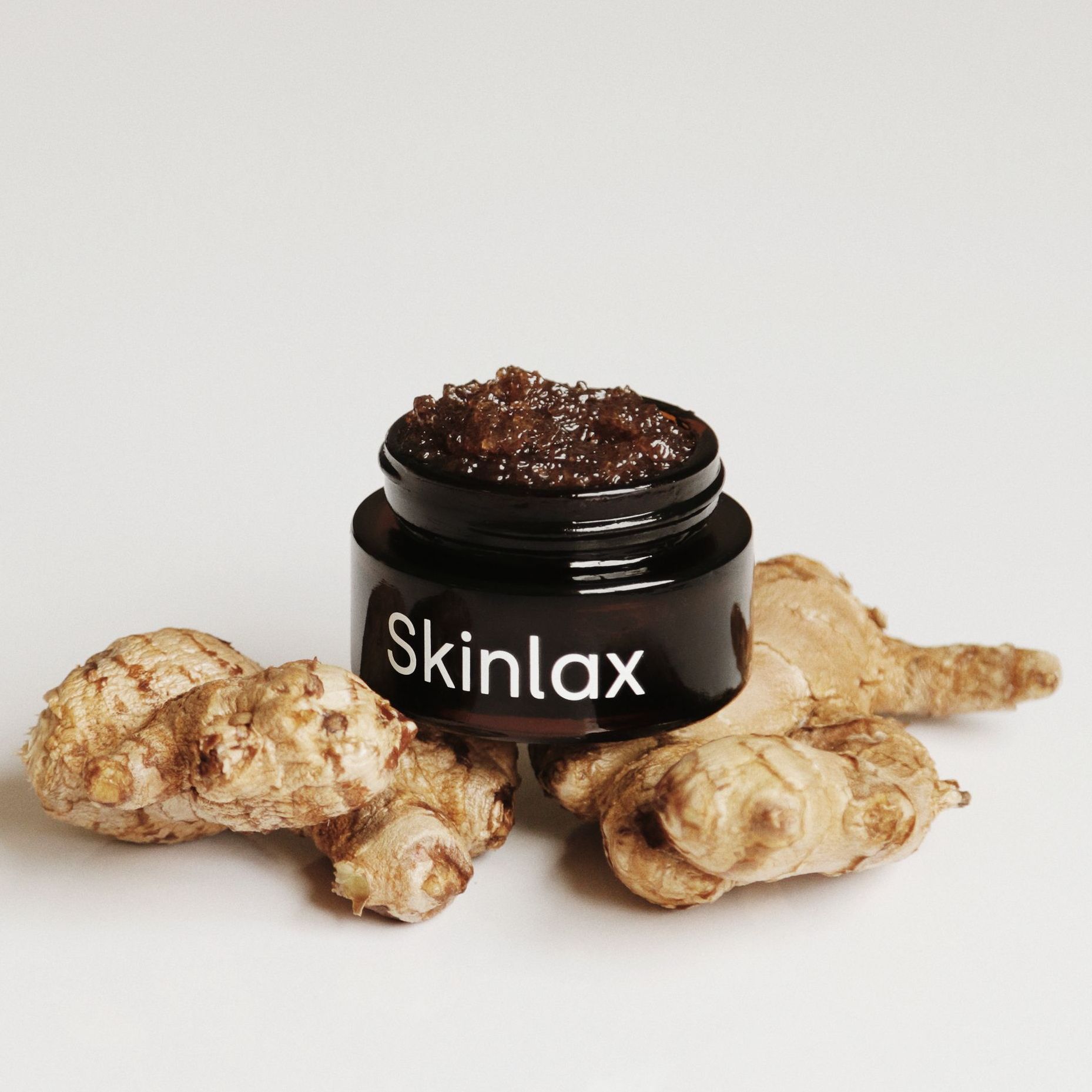 Tẩy Da Chết Môi Mật Ong Gừng Skinlax 20g