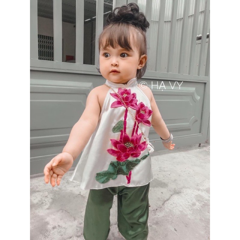 Tóc giả búi xoăn dành cho bé gái, dạng cột dây chun tiện lợi, dễ sử dụng.