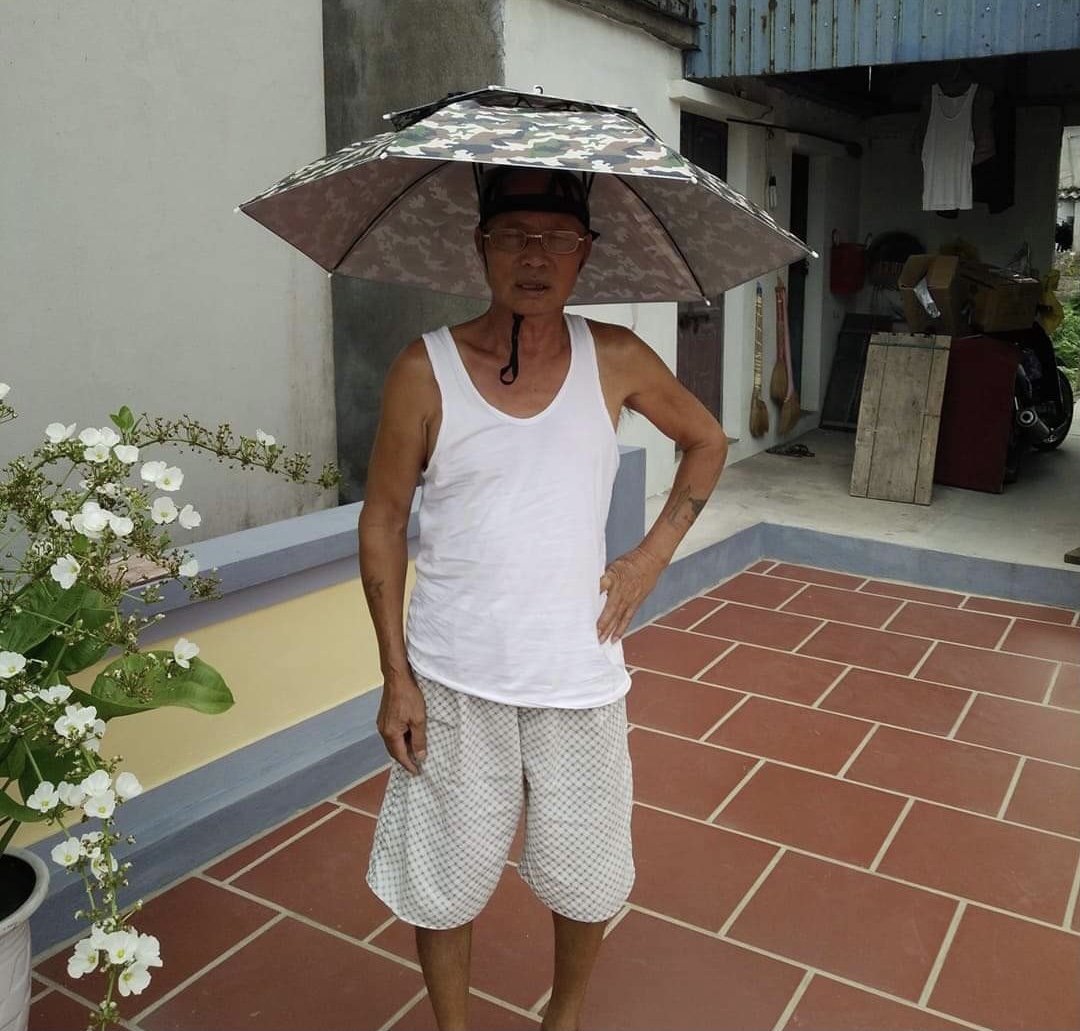 Ô dù đội đầu đi câu