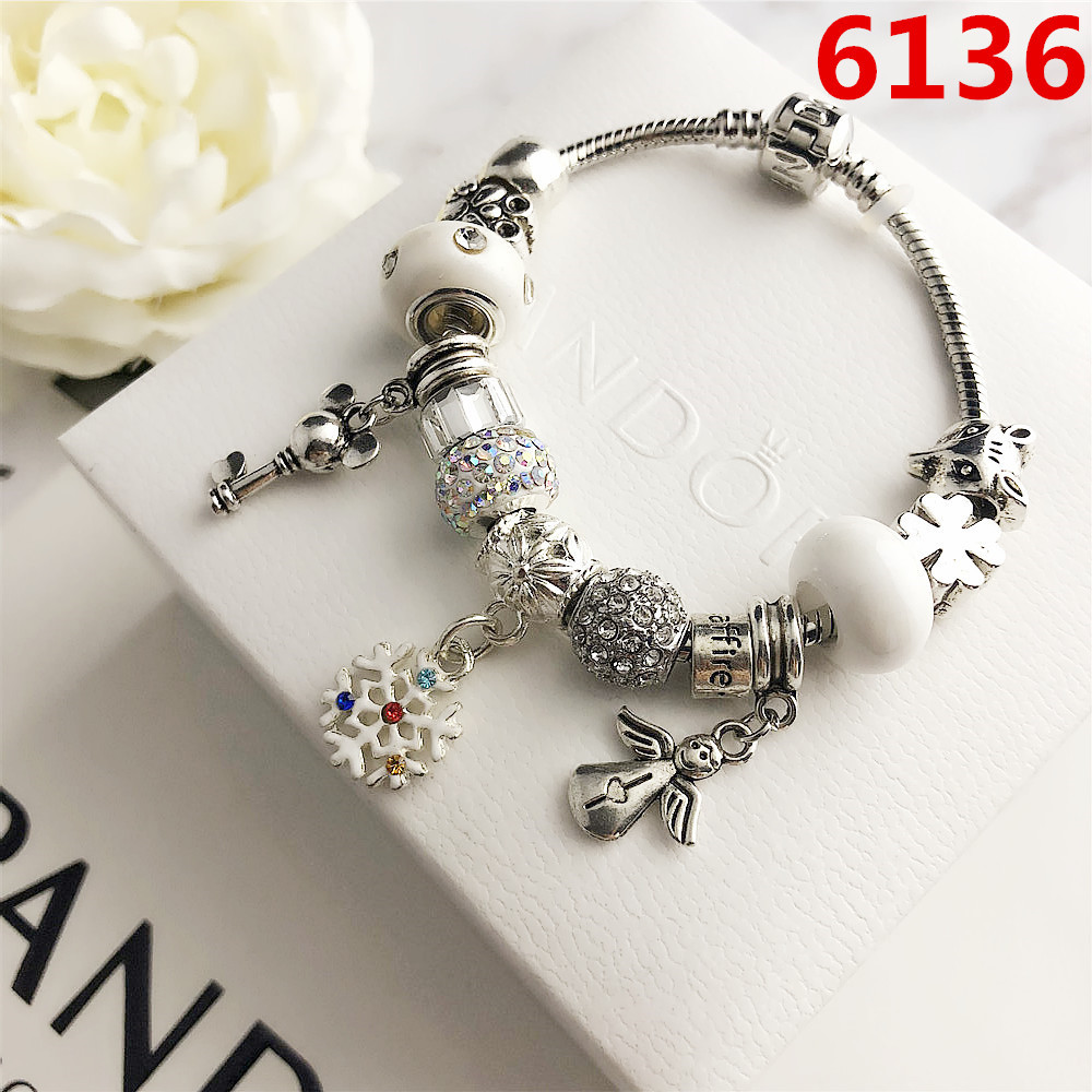 Lắc tay nữ pandora bông tuyết trắng đính cờm bạc s925