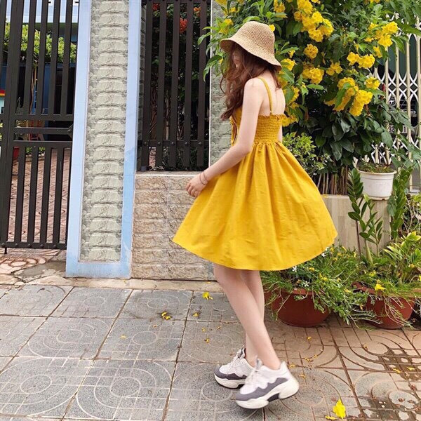Đầm nữ màu vàng dáng xòe nhúm lưng