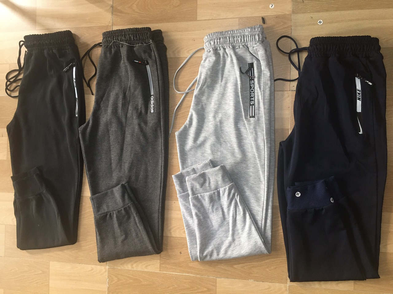 Quần thun 3 sọc có khóa kéo size 40 -80kg