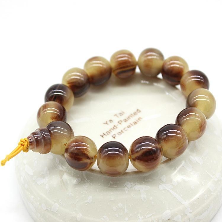 Vòng tay phong thủy chuỗi hạt châu trắng đen 10 ly ld028
