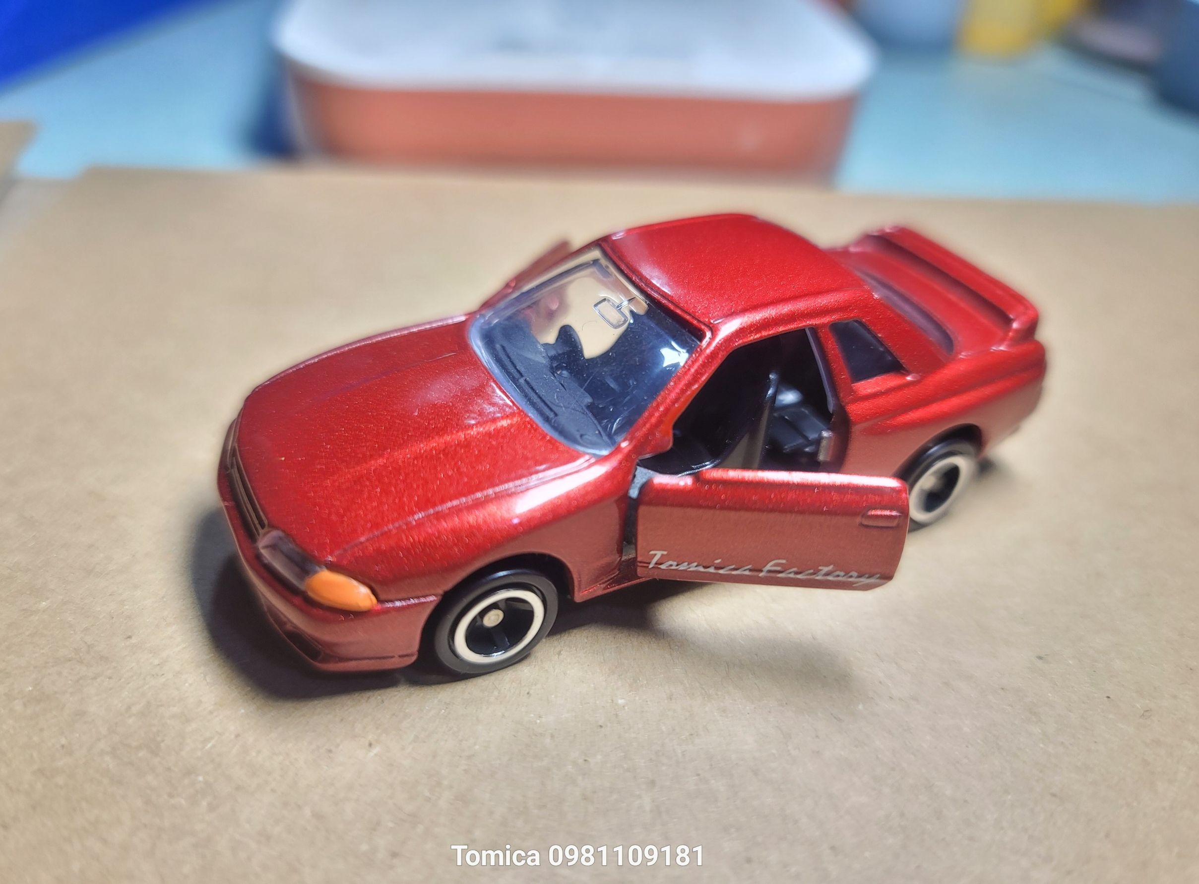 Thanh lý Xe mô hình Tomica - Xe Nissan Skyline R32 màu đỏ cam mở được cửa giá rẻ cho bé sưu tập