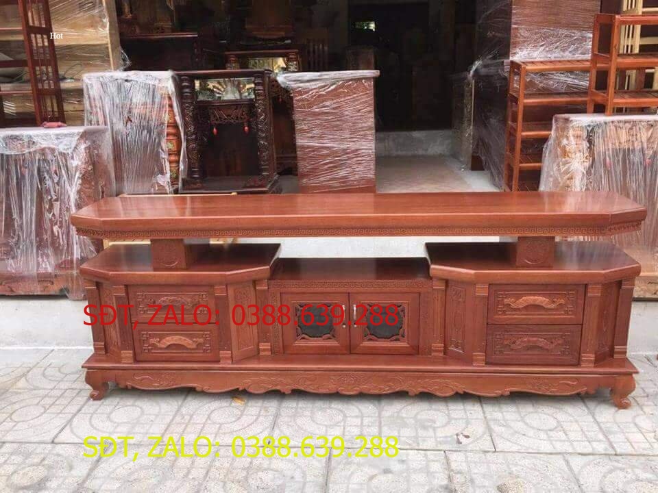 Kệ tivi vát cạnh gỗ xoan đào dài 2m màu cánh gián vân gỗ tự nhiên gỗ đã được xử lý tẩm sấy chống mối mọt sơn PU tỉ mỉ cẩn thận kiểu dáng mới mẻ sang trọng .