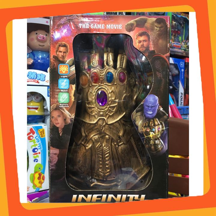 Đồ chơi găng tay siêu nhân Thanos chất liệu cao su có đèn và nhạc